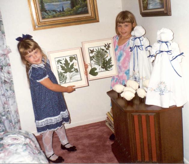 Melissa and Michelle showing off some excellent crafts - made with Grandma Helen